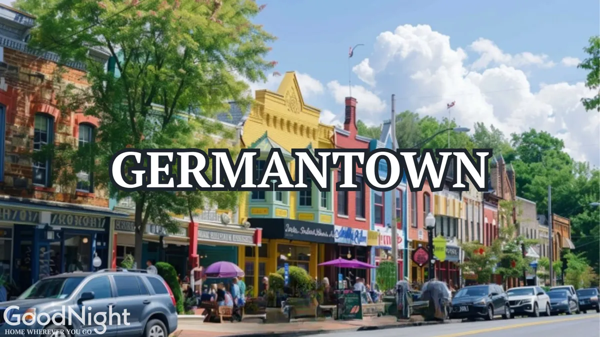 A lively street scene with colorful storefronts, groups of people enjoying themselves, and lush green foliage. Outdoor dining areas and inviting shopfronts suggest a vibrant, walkable neighborhood atmosphere that encourages socializing and exploration.